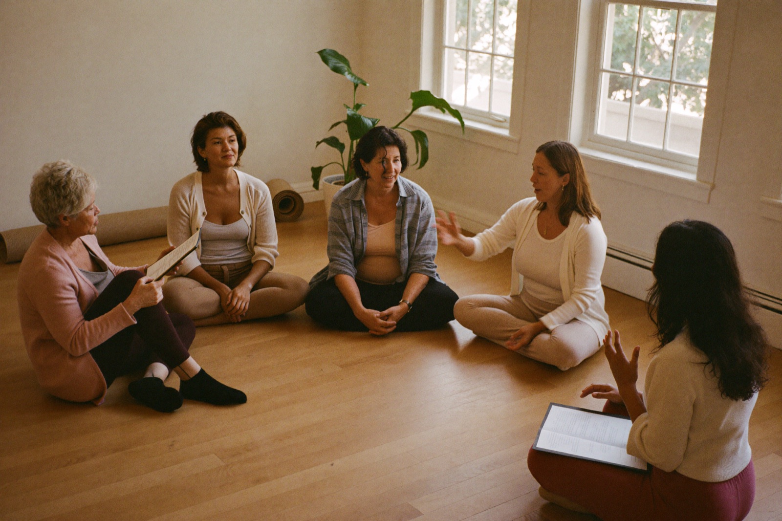 Small group of women in a warm coaching circle